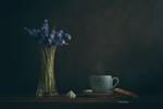 Цветы и чашка кофе..